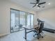 Home office with a sliding glass door, an office table and a treadmill at 20961 E Stacey Rd, Queen Creek, AZ 85142