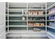 Walk-in pantry has extensive shelving and storage options at 20961 E Stacey Rd, Queen Creek, AZ 85142
