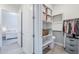 Bright walk-in closet with ample shelving, drawers, and hanging space at 20961 E Stacey Rd, Queen Creek, AZ 85142