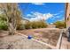 The backyard features potential planting areas, and a gravel yard at 21752 E Domingo Rd, Queen Creek, AZ 85142