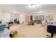 Open basement space with carpeted floor, recessed lighting, and plenty of room for activities or storage at 21752 E Domingo Rd, Queen Creek, AZ 85142