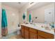 Bathroom with toilet, sink and shower-tub combo at 21752 E Domingo Rd, Queen Creek, AZ 85142