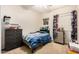 Bedroom with ceiling fan, natural light and carpeted floors at 21752 E Domingo Rd, Queen Creek, AZ 85142