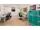 Craft room with sewing machine, storage cubes, work station and carpeted floors at 21752 E Domingo Rd, Queen Creek, AZ 85142