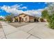 Lovely single-story home with a two car garage and a well-maintained landscape at 21752 E Domingo Rd, Queen Creek, AZ 85142