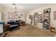 Neutral living room featuring carpeted floors, and ample closet space at 21752 E Domingo Rd, Queen Creek, AZ 85142