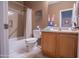 Functional bathroom with tub, shower, and single vanity at 22520 W Moonlight Path, Buckeye, AZ 85326
