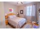 Cozy bedroom with a comfy bed and matching nightstands at 22520 W Moonlight Path, Buckeye, AZ 85326