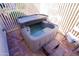 Inviting hot tub on a brick patio for relaxation and recreation at 22520 W Moonlight Path, Buckeye, AZ 85326