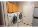 Convenient laundry room with modern washer and dryer at 22520 W Moonlight Path, Buckeye, AZ 85326