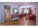 Inviting living room with wood floors and furniture at 22520 W Moonlight Path, Buckeye, AZ 85326