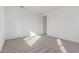 Bright bedroom featuring neutral carpet, white walls, and multiple electrical outlets at 24134 N 172Nd Ave, Surprise, AZ 85387