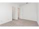 Bright and airy bedroom with neutral carpeting and ample space at 24134 N 172Nd Ave, Surprise, AZ 85387