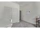 Versatile room with closet and adjacent space, complemented by neutral tones and efficient layout at 24408 W Ripple Rd, Buckeye, AZ 85326