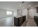 A kitchen features stainless steel appliances, stone countertops, and tile floors at 2514 E Music Mountain Ave, Apache Junction, AZ 85119