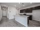 An eat-in kitchen with granite counters, stainless appliances, and wood-look floors at 2514 E Music Mountain Ave, Apache Junction, AZ 85119