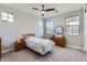 Comfortable bedroom with carpet, ceiling fan and 3 windows at 26978 N 74Th Ln, Peoria, AZ 85383