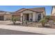 Charming home with desert landscaping, tile roof, and inviting front entry at 26978 N 74Th Ln, Peoria, AZ 85383