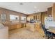 Spacious kitchen featuring tile floors, a central island, and stainless steel appliances at 3052 S Wesley --, Mesa, AZ 85212