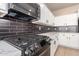 Kitchen with stainless steel microwave and white quartz countertops, a chef's dream at 3450 S Falcon Dr, Gilbert, AZ 85297