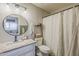 Bright bathroom with granite countertops, updated fixtures, and a decorative mirror at 3491 N Arizona Ave # 167, Chandler, AZ 85225