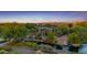 Picturesque community park with lush landscaping, water features, playground, and walking paths creating a vibrant recreational space at 3690 E Blue Spruce Ln, Gilbert, AZ 85298