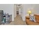 Inviting hallway view with an office area, neutral colors, and tiled flooring at 3690 E Blue Spruce Ln, Gilbert, AZ 85298