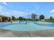 Community splash pad featuring colorful structures, water features, and nearby picnic shelter with inviting neighborhood surroundings at 3690 E Blue Spruce Ln, Gilbert, AZ 85298