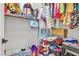 Walk-in closet with shelving and hanging racks for organized storage of clothing and accessories at 3690 E Blue Spruce Ln, Gilbert, AZ 85298