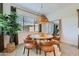 Cozy dining area with stylish chandelier, round table, and plenty of natural light at 3735 E Kenley Ln, San Tan Valley, AZ 85143