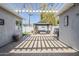 This backyard features a covered patio, providing an inviting space for outdoor relaxation and entertainment at 4402 E Montecito Ave, Phoenix, AZ 85018