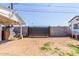 Backyard showcasing an enclosed space with a gate and surrounding brick walls at 4521 W Clarendon Ave, Phoenix, AZ 85031