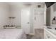 Cozy bedroom featuring carpeted floors, a closet door, and neutral-toned walls at 4521 W Clarendon Ave, Phoenix, AZ 85031