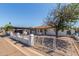 Charming single-story home with a covered carport and quaint, low-walled front yard at 4521 W Clarendon Ave, Phoenix, AZ 85031