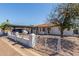 Charming single-story home with a covered carport and quaint, low-walled front yard at 4521 W Clarendon Ave, Phoenix, AZ 85031