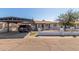 Charming single-story home with a covered carport and quaint, low-walled front yard at 4521 W Clarendon Ave, Phoenix, AZ 85031