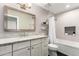 Modern bathroom with granite countertops, tiled shower, and updated fixtures at 4839 E Marilyn Rd, Scottsdale, AZ 85254