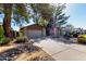 Charming single-Gathering home features brick accents and a well-manicured desert landscape with colorful plants at 4839 E Marilyn Rd, Scottsdale, AZ 85254