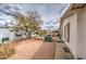 Private backyard with desert landscaping, patio seating, and a relaxing outdoor area at 5524 E Harmon Cir, Mesa, AZ 85215
