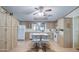 Bright and spacious kitchen featuring ample cabinet space, modern appliances, and a center island at 5524 E Harmon Cir, Mesa, AZ 85215