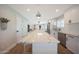 Kitchen with an oversized island, stainless appliances, and white shaker cabinets at 6320 N 4Th Pl, Phoenix, AZ 85012