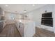 Well-lit kitchen with stainless steel appliances, a center island, and modern fixtures at 6320 N 4Th Pl, Phoenix, AZ 85012