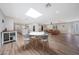 Open-concept living area with dining space, kitchen, and natural light at 6320 N 4Th Pl, Phoenix, AZ 85012