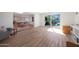 Open living area with tile flooring and access to an outdoor pool area at 6320 N 4Th Pl, Phoenix, AZ 85012