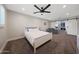 Open main bedroom with light walls, carpet, and a barn door to a walk-in closet at 6320 N 4Th Pl, Phoenix, AZ 85012