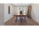 Office space with a wooden desk, wood floors, and natural light at 6320 N 4Th Pl, Phoenix, AZ 85012