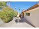 Charming patio featuring a dining table and a cozy space with a hammock, perfect for outdoor relaxation and entertaining at 6320 N 4Th Pl, Phoenix, AZ 85012