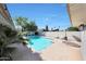Backyard pool with lounge area for entertaining guests under the bright sky at 6320 N 4Th Pl, Phoenix, AZ 85012