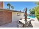 Inviting backyard featuring a patio, swimming pool, and lush greenery, perfect for relaxing and enjoying the outdoors at 6320 N 4Th Pl, Phoenix, AZ 85012