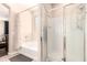 Bright bathroom featuring a tub and shower, designed with clean lines at 6822 W Alta Vista Rd, Laveen, AZ 85339
